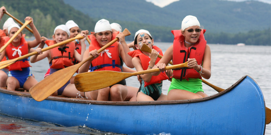 Camper take to Brant Lake in an extra long canoe