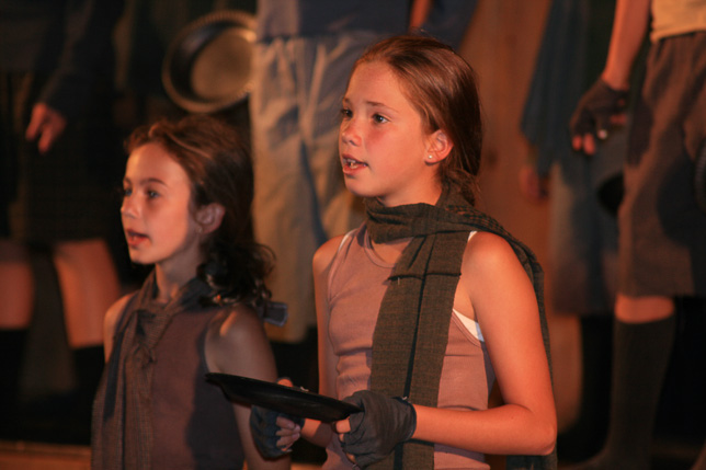 Campers singing in theater