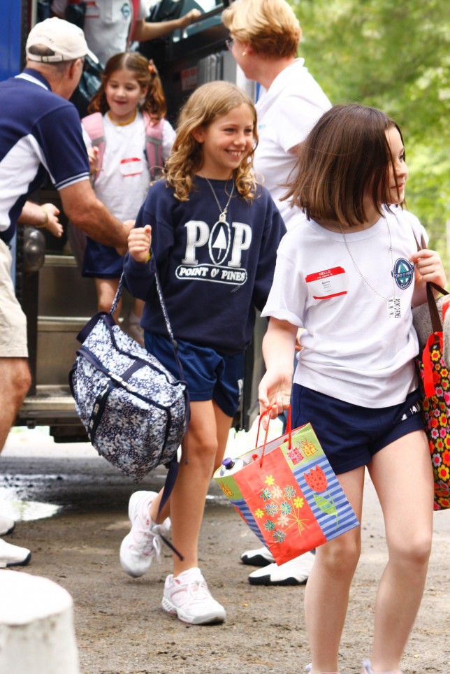 Campers arriving at a girls camp