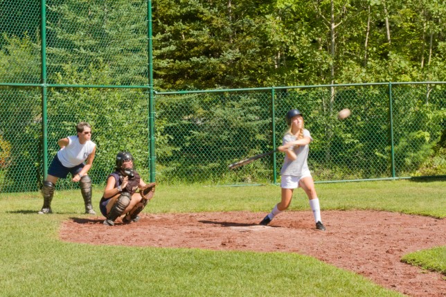 201007252052 A batter swinging at the softball