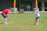 Instructor giving tips on Field Hockey Form