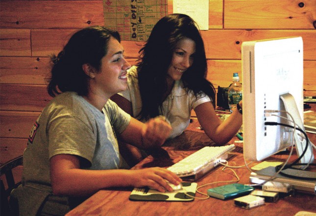 201008065056 Two girls working at an editing station
