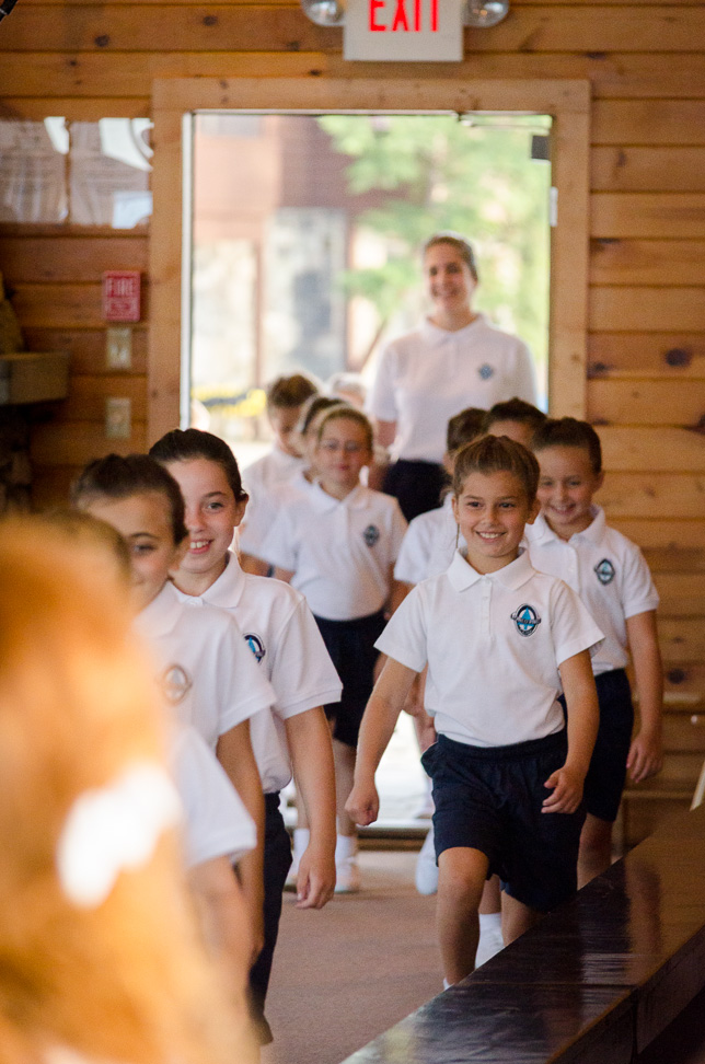 Campers march in for our Team Sing