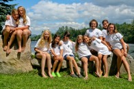 A cabin shot of girls with their counselors