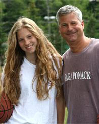 20090724392 A camper with her father during Visiting Day