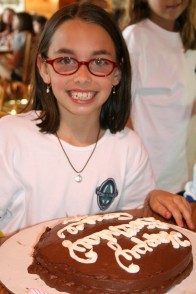 A camper with her birthday cake